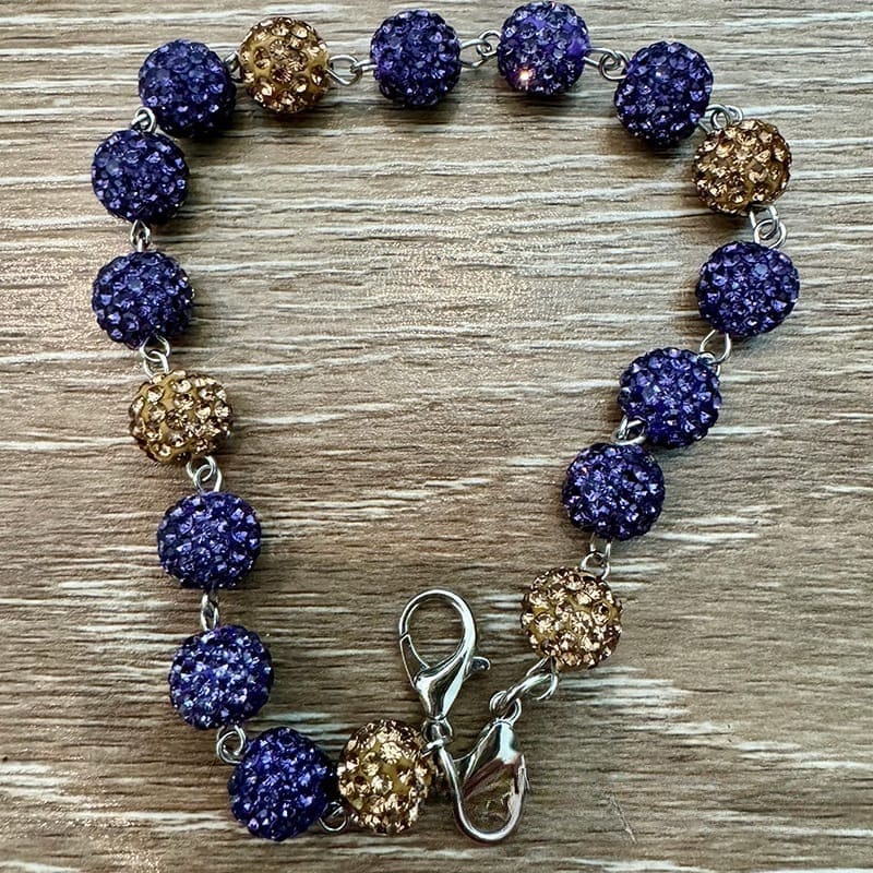 On A Whim Hats Purple and Gold Sparkly Hat Chain