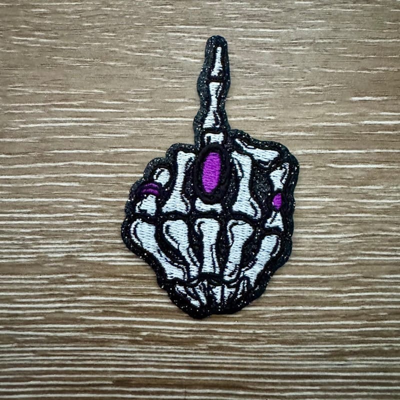 On A Whim Hats Purple Skull Finger Iron-On Patch