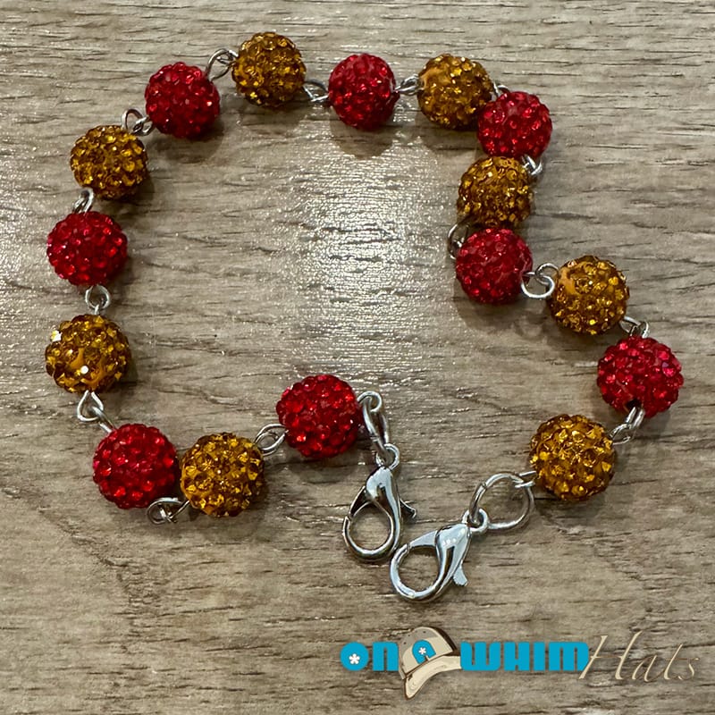 On A Whim Hats Red and Gold Sparkly Hat Chain