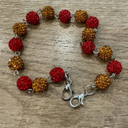 On A Whim Hats Red and Gold Sparkly Hat Chain