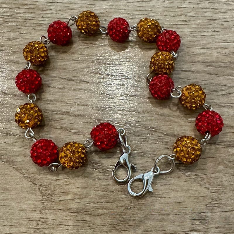 On A Whim Hats Red and Gold Sparkly Hat Chain