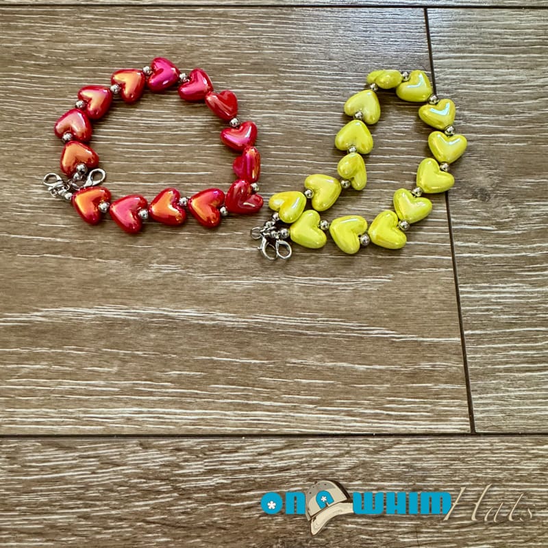 On A Whim Hats Red and Yellow Heart Hat Chains