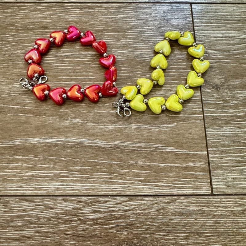 On A Whim Hats Red and Yellow Heart Hat Chains