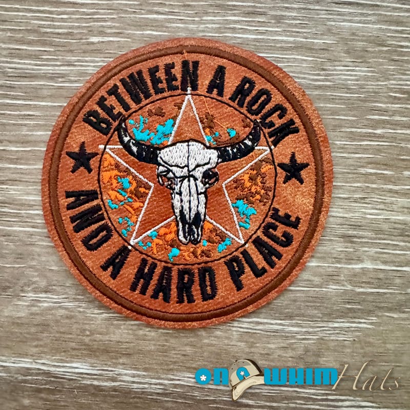 On A Whim Hats Rock and a Hard Place Leather Iron-On Patch
