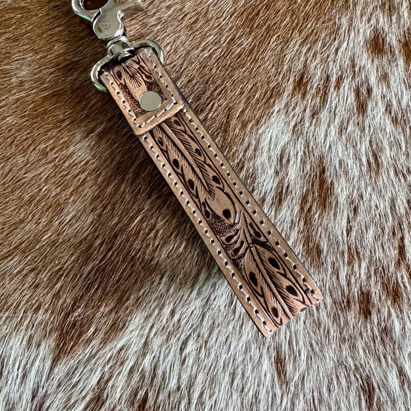 Rodeo Baby Western hand-tooled leather and cowhide keychain detail