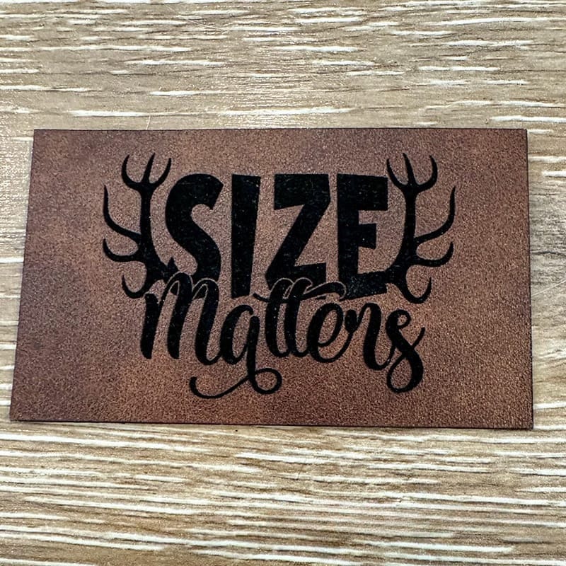 On A Whim Hats Size Matters Leatherette Iron-On Patch