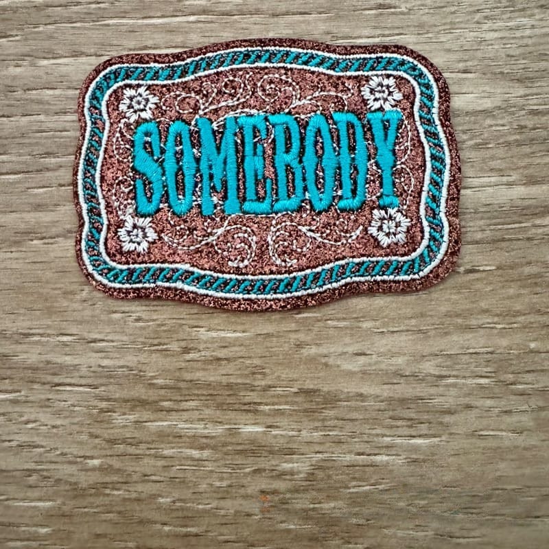 On A Whim Hats Somebody Iron-On Patch
