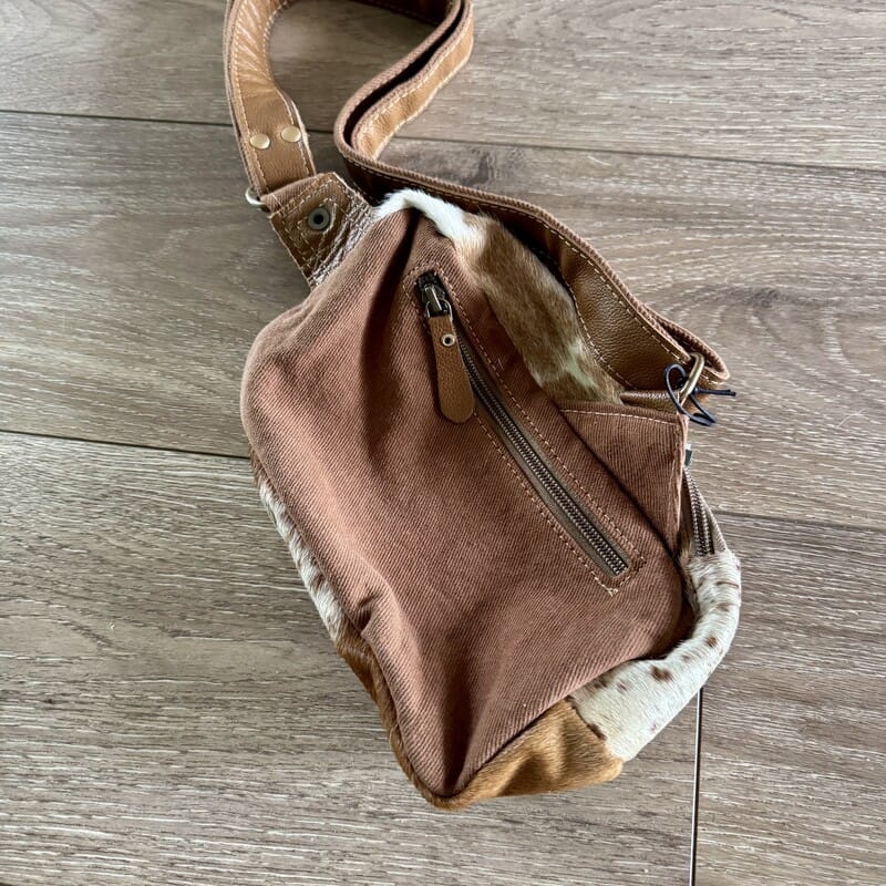 Stand-Out cowhide Western belt bag worn at the waist or crossbody, hands-free fanny pack