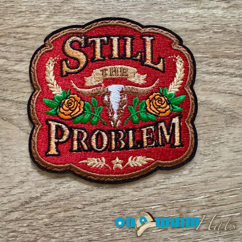 On A Whim Hats Still the Problem Embroidered Iron-On Patch