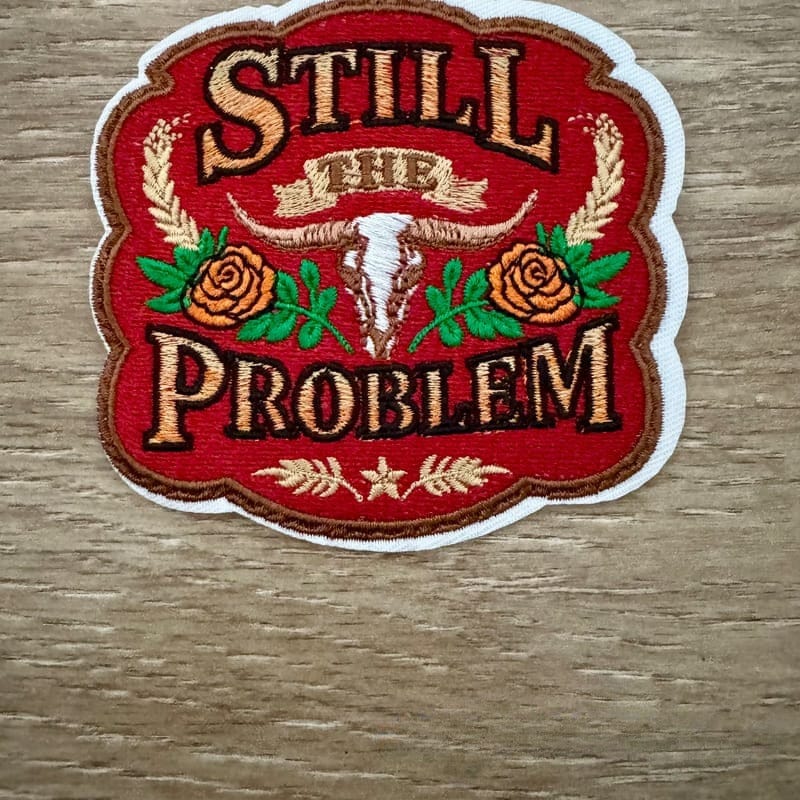 On A Whim Hats Still the Problem Embroidered Iron-On Patch