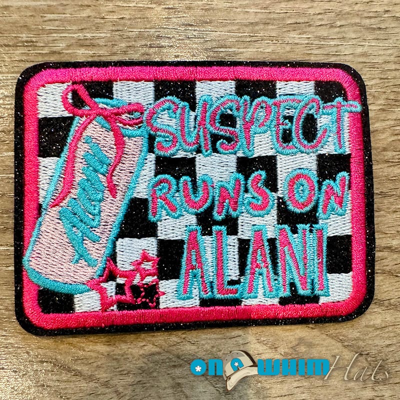 On A Whim Hats Suspect Runs On Alani Embroidered Iron-On Patch