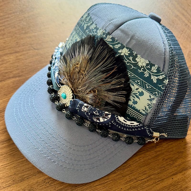 On A Whim Hats Boho Feather Trucker Hat with Turquoise Stone & Gold Chain
