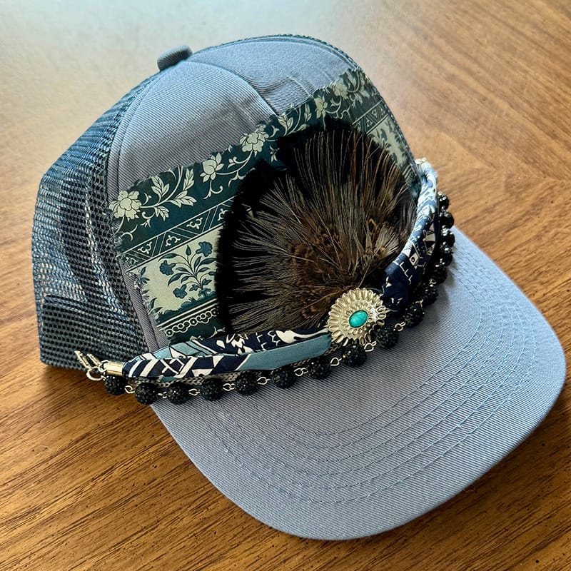 On A Whim Hats Boho Feather Trucker Hat with Turquoise Stone & Gold Chain