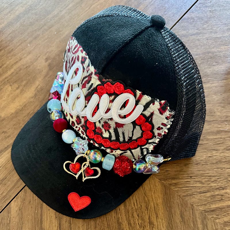 On A Whim Hats Love Trucker Hat - Black Suede with Red Leopard Tapestry & Heart Charm Chain
