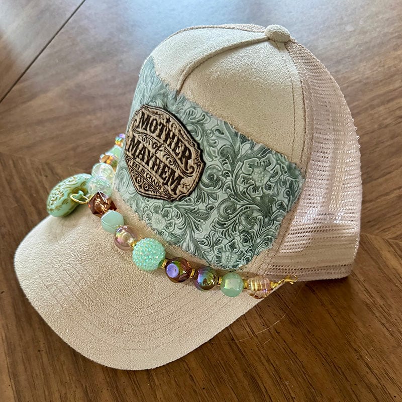 On A Whim Hats Mother of Mayhem Trucker Hat - Cream Suede with Tooled Floral & Beaded Heart Chain