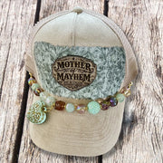 On A Whim Hats Mother of Mayhem Trucker Hat - Cream Suede with Tooled Floral & Beaded Heart Chain