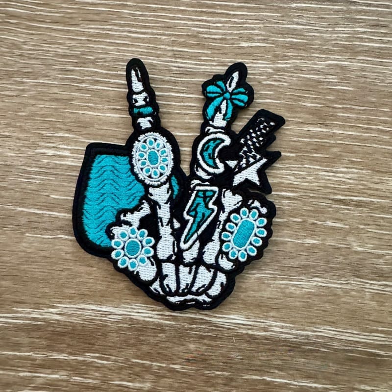 On A Whim Hats Turquoise Skelly Hand Iron-On Patch