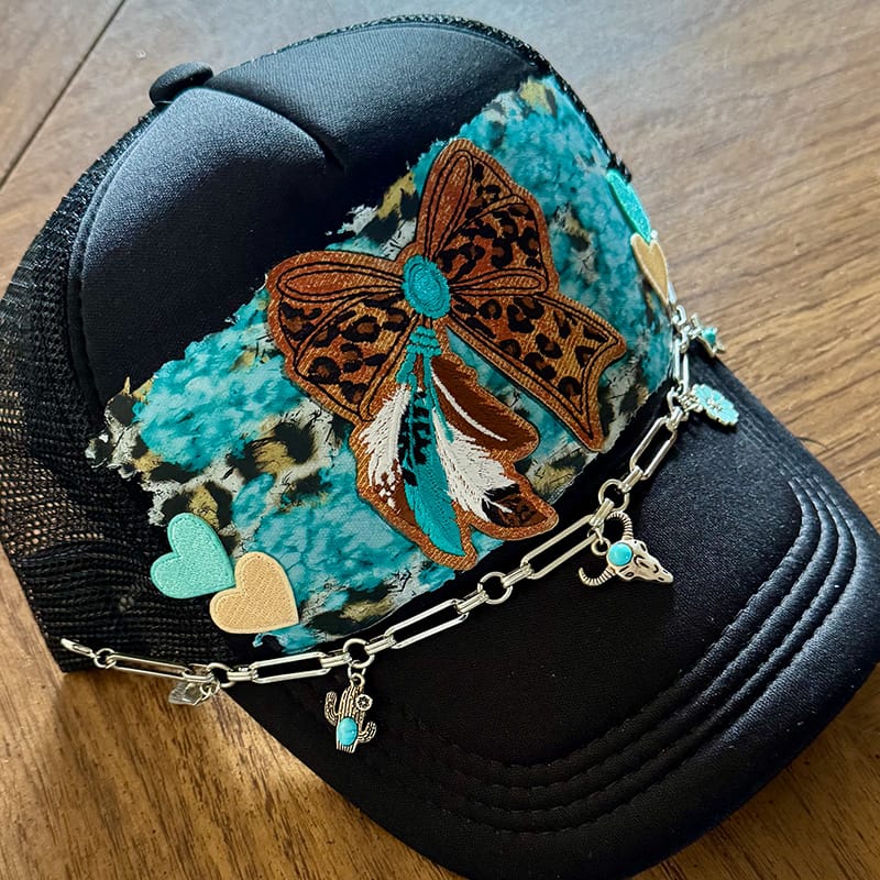 On A Whim Hats Western Bow Handmade Trucker Hat w/ Leather Patch