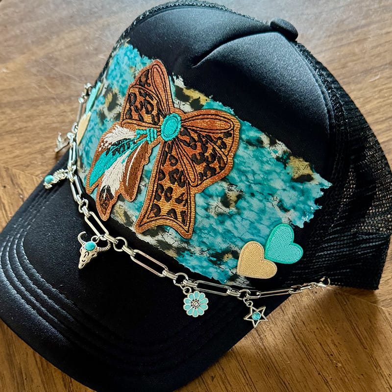 On A Whim Hats Western Bow Handmade Trucker Hat w/ Leather Patch