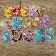 On A Whim Hats X-L Everything Sucks Sequin Iron-On Patch